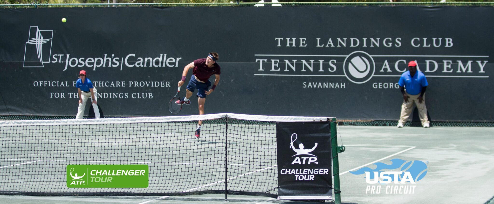 A male tennis player serves up the ball during the Savannah Challenger Tennis Tournament.