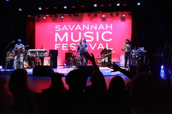 Concert goers enjoy the music on stage at the Savannah Music Festival.