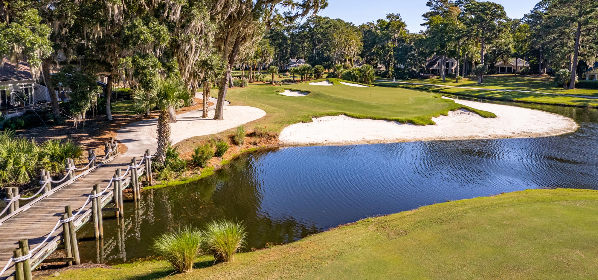Water hazard, sand traps and green on one of the six championship golf courses at The Landings.