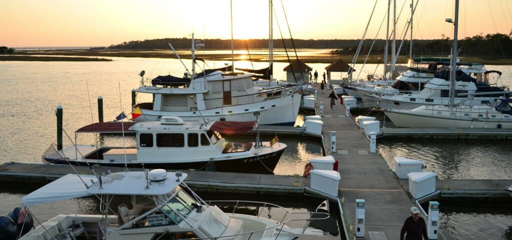 Boats docked at one of The Landings' two deep-water marinas at sunset.