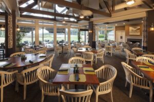 Casual dining room tables and chairs at the Deer Creek Grill.