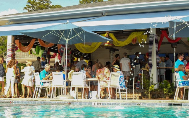 Pool goers and sun seekers alike gather for a sandwich or cool cocktail at the poolside Cabana Bar.