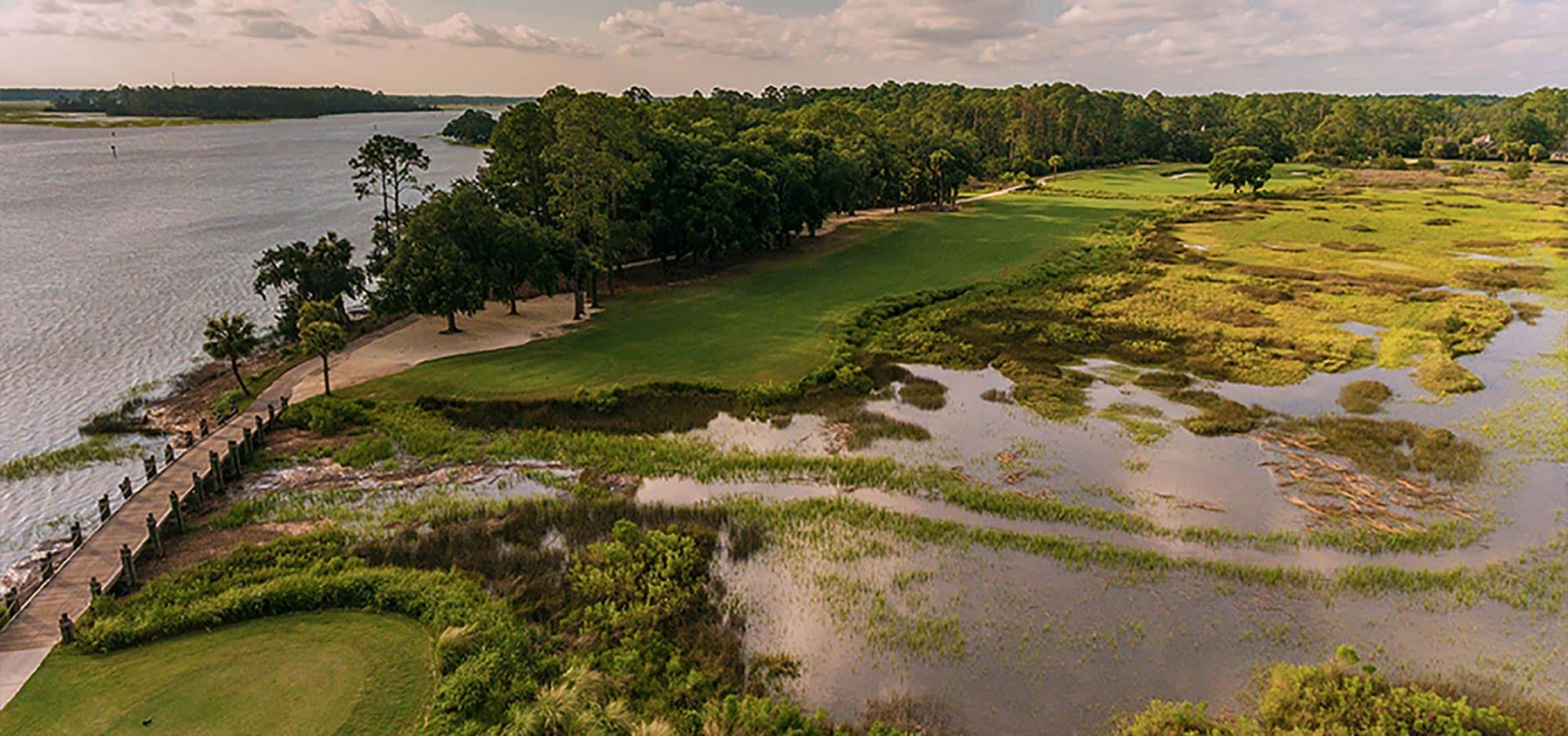 The Oakridge course features water, bunkers, marsh, and a split-level fairway next to a path along the Intracoastal waterway.